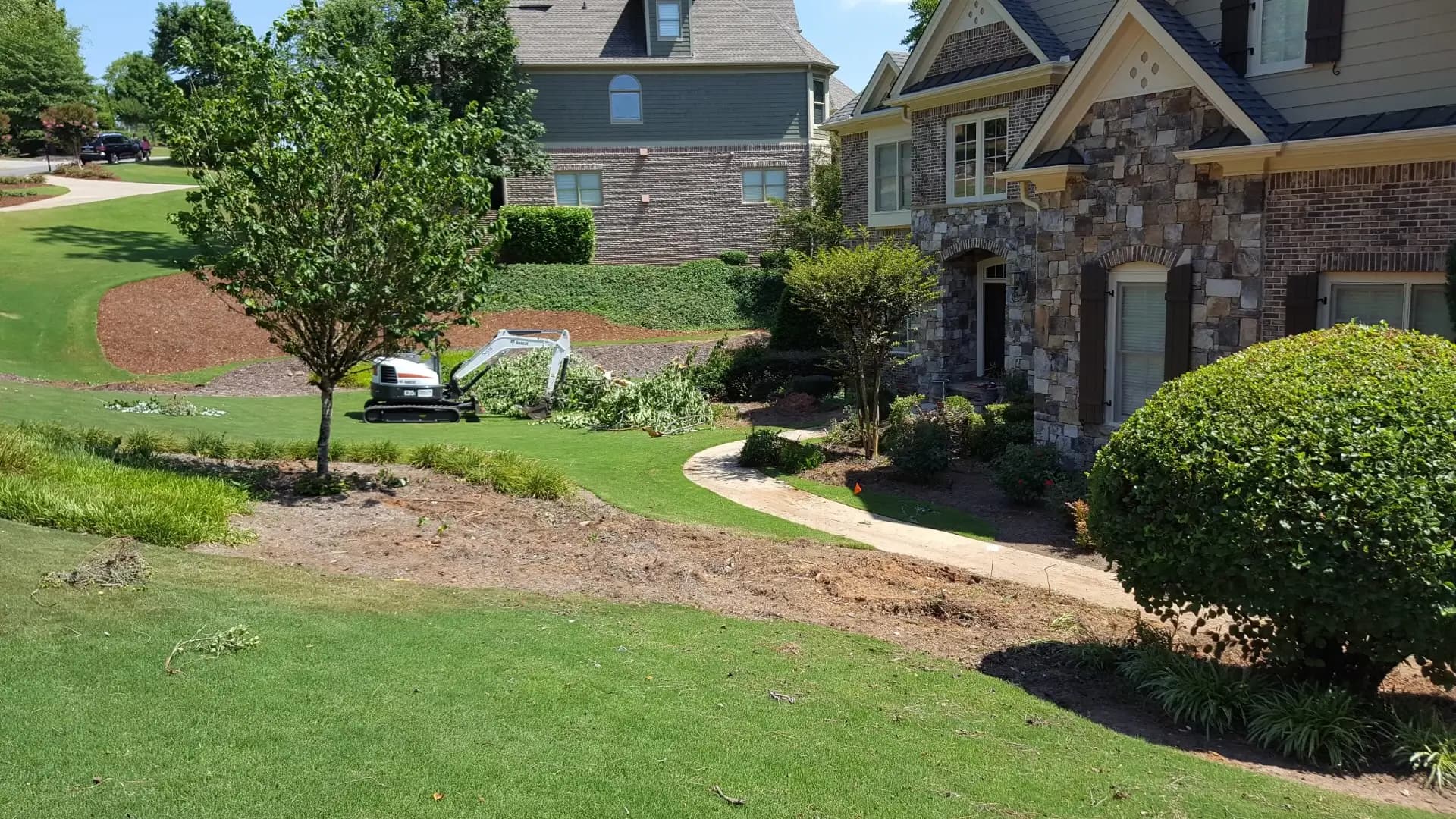 Side of a house, showing off the front yard